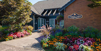 Crown Court Clubhouse Entrance & Floral Landscaping