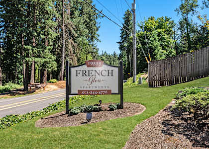 a sign for french lion apartments