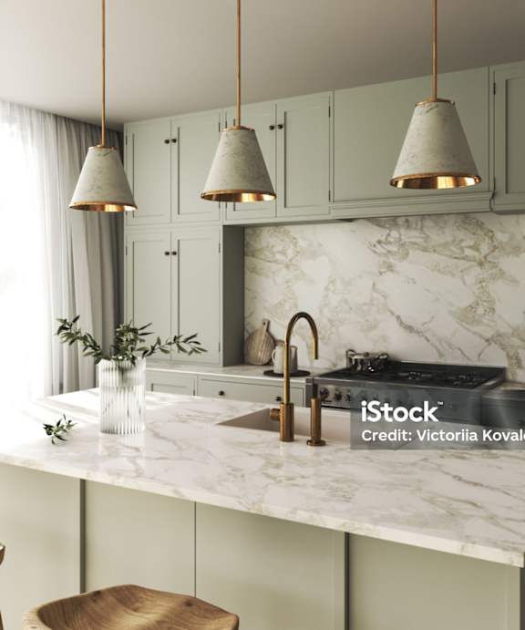 Modern kitchen with sage green cabinets