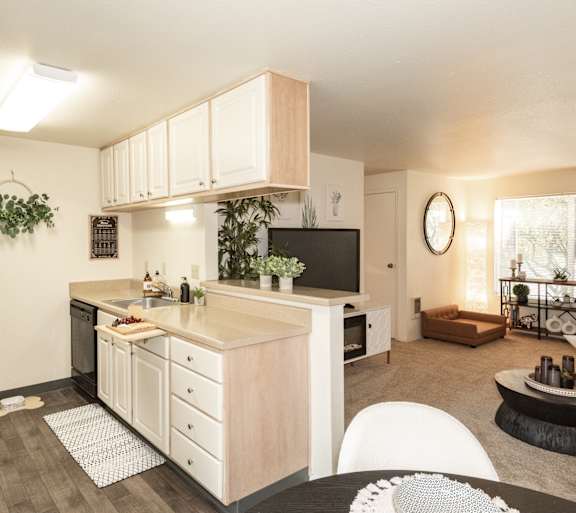 Interior layout of a kitchen and living room at Crown Court Apartments