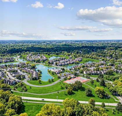 A view of a residential area with a river running through it.
