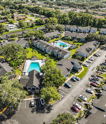 a view of a pool from above in a parking lot at Oak Reserve at Winter Park, Winter Park
