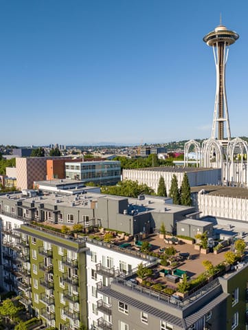 a view of the space needle from the top of a building in seattle