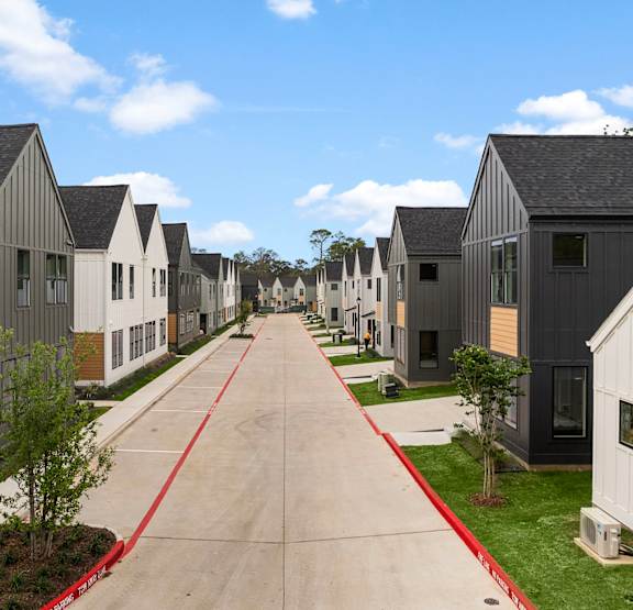 a rendering of a house with a street in front of it