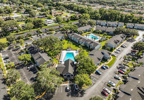 a view of a pool from above in a parking lot at Oak Reserve at Winter Park, Winter Park