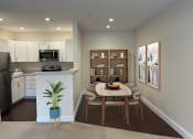 Thumbnail 15 of 28 - a kitchen and dining area