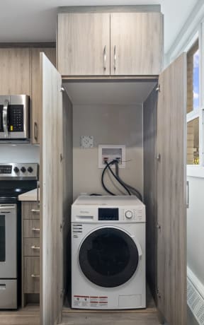 a laundry room with a washer and dryer