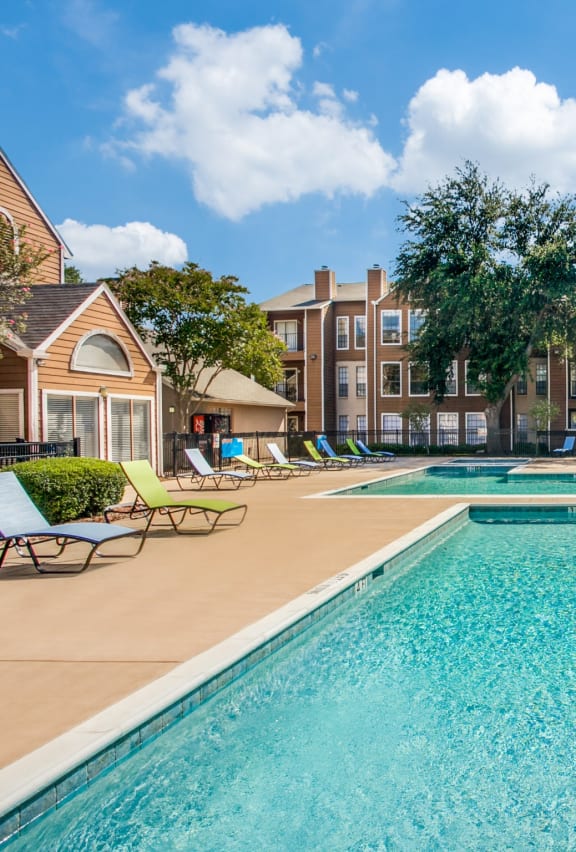 the preserve at ballantyne commons pool and apartment buildings at Seacrest Apartments, Garland, TX