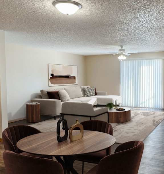 Bismarck, ND Sierra Ridge |a bedroom with a bed and a dresser and two windows