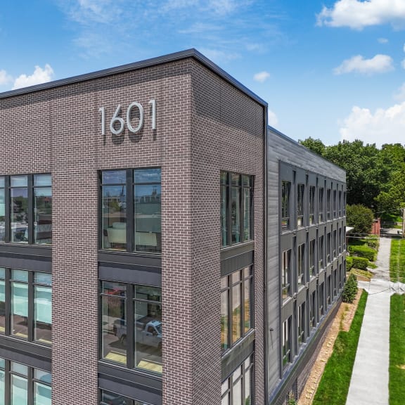 the side of a brick building with the number 1001 on it