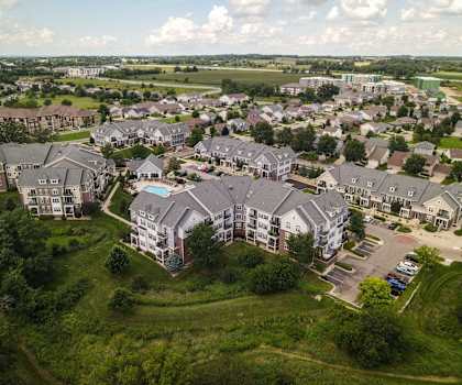 an aerial view of a group of houses in a suburb