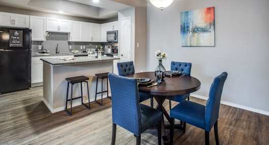 Model Dining Room and Kitchen at La Ventura Apartments, Plano, TX