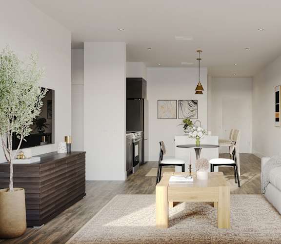 a living room and dining room with a couch and a table