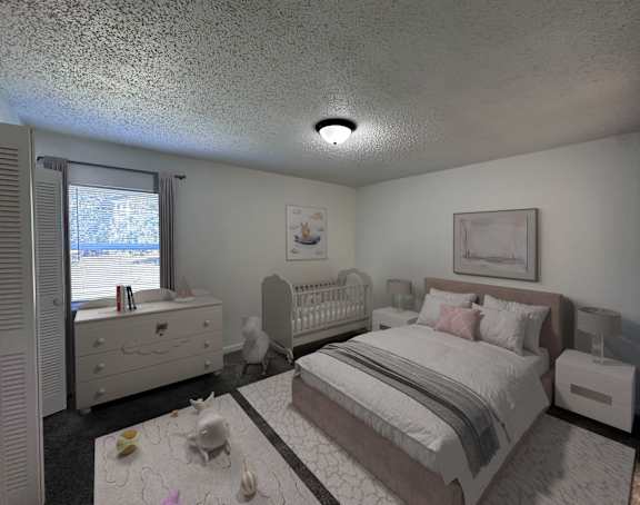 A bedroom with a large bed and a smaller bed in the corner.