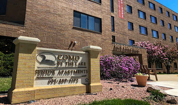 a large building with a sign in front of it