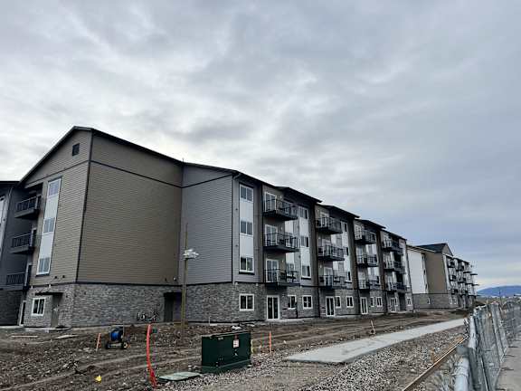 new apartment building on a cloudy day