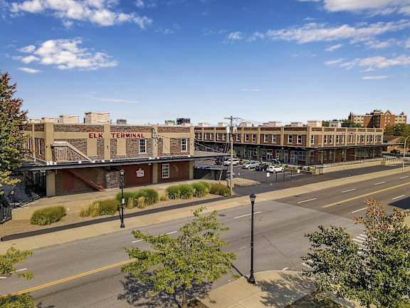 an aerial view of a city street and a building at The Lofts at Elk Terminal Apartments , New York 14202