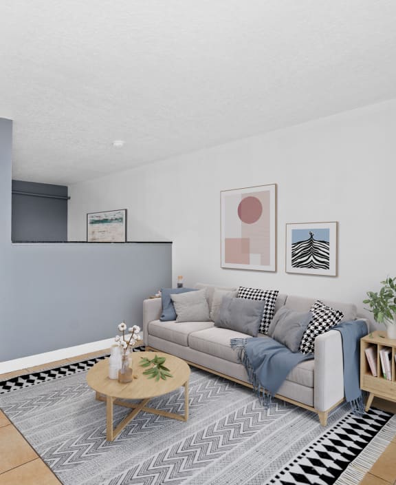 a living room with a couch and coffee table