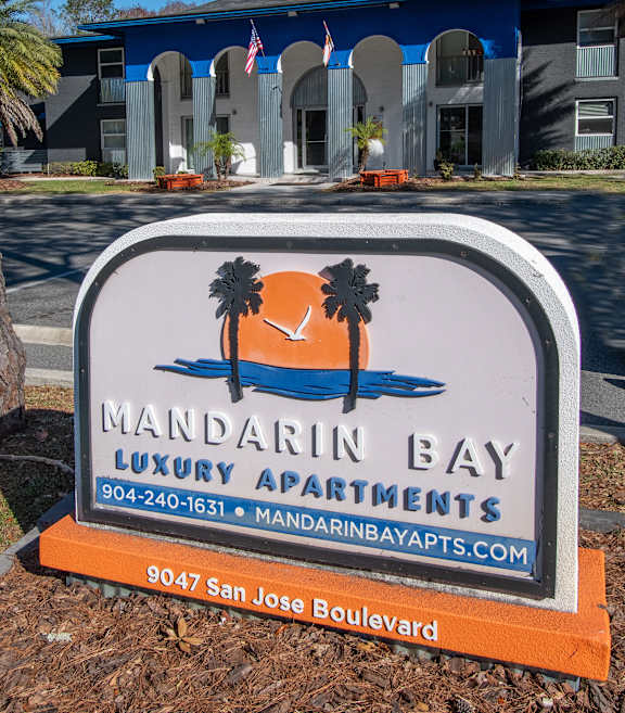 A monument sign that reads Mandarin Bay Luxury Apartments in Jacksonville, FL.