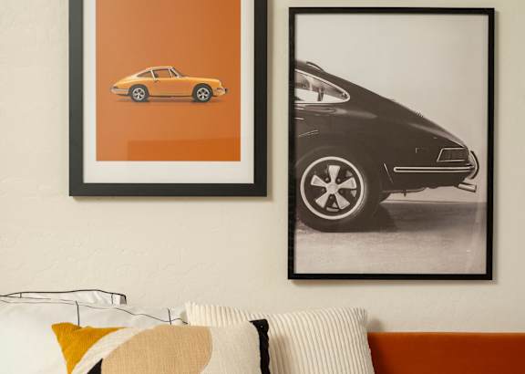a rendering of a building with cars and palm trees