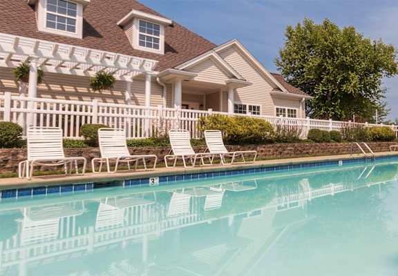 This is a picture of the Albamarle clubhouse pool area at Fairfield Pointe Apartments in Fairfield, Ohio.