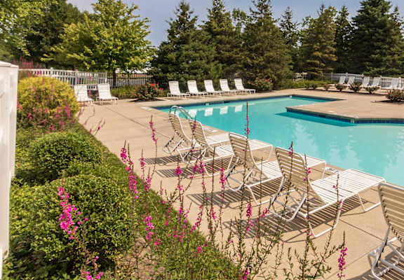 This is a picture of the Albamarle clubhouse pool area at Fairfield Pointe Apartments in Fairfield, Ohio.