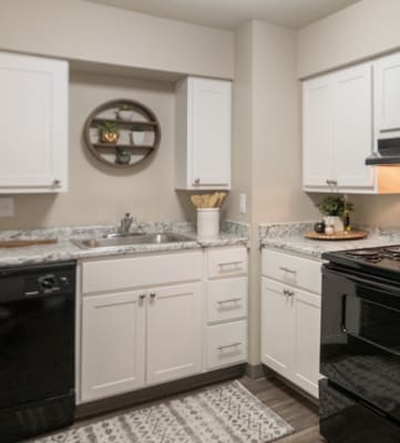 This is picture of the kitchen in the 823 square foot 2 bedroom apartment at Aspen Village Apartments in the Westwood neighborhood of Cincinnati, OH.