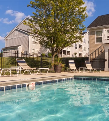This is a photo of the pool area at Trails of Saddlebrook Apartments in Florence, KY.