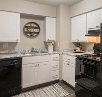 This is picture of the kitchen in the 823 square foot 2 bedroom apartment at Aspen Village Apartments in the Westwood neighborhood of Cincinnati, OH.