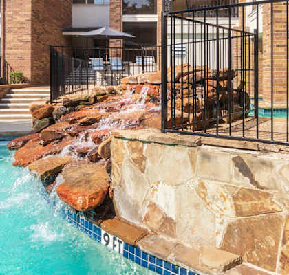 This is a photo of the primary pool area at Cambridge Court Apartments in Dallas, TX.