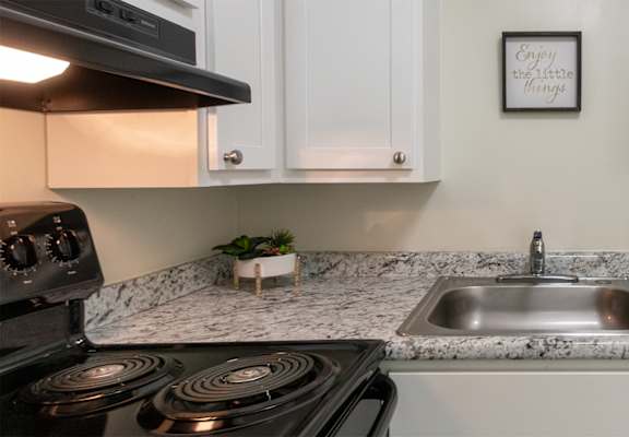 This is a photo of the kitchen in a 560 square foot, 1 bedroom, 1 bath apartment at Aspen Village Apartments in Cincinnati, OH.
