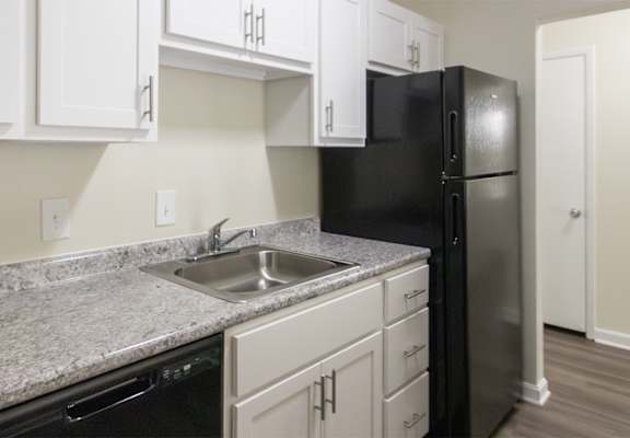 This is a photo of the kitchen in the 543 square foot A-style, 1 bedroom, 1 bath apartment at Blue Grass Manor Apartments in Erlanger, KY.