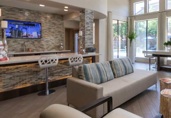 This is a photo of the leasing office/clubhouse at The Brownstones Townhome Apartments in Dallas, TX.