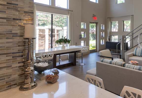 This is a photo of the leasing office/clubhouse at The Brownstones Townhome Apartments in Dallas, TX.