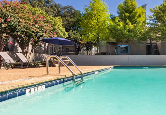 The pool area at The Biltmore Apartments located in the Vickery Midtown neighborhood of Dallas, TX.