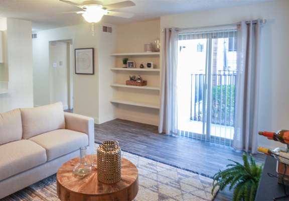 Photo of the living room in a 692 square foot 1 bed, 1 bath model aprtment at Cambridge Court Apartments in Dallas Texas