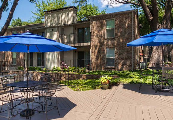 This is a photo of BBQ area/patio at Canyon Creek Apartments in Dallas, TX.