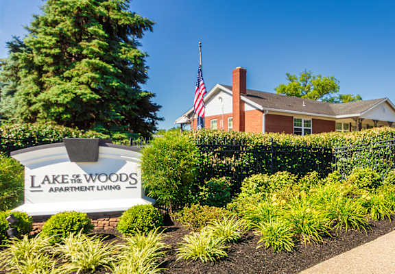 Lake of the Woods Apartments entrance sign with landscaped walkway in Mount Healthy, Ohio