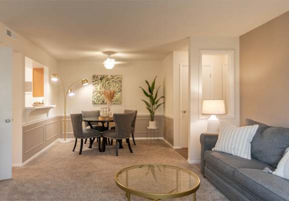 This is a photo of the dining area from the living room in the 822 square foot, 2 bedroom, 1 bath floor plan at Village East Apartments in Franklin, OH.