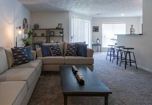This is a photo of the living room in the 1100 square foot 2 bedroom Kettering floor plan at Washington Park Apartments in Centerville, OH.