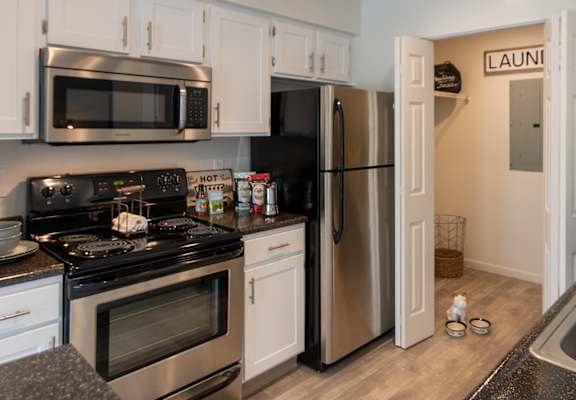 This is a photo of the kitchen in the 1100 square foot 2 bedroom Kettering floor plan at Washington Park Apartments in Centerville, OH.