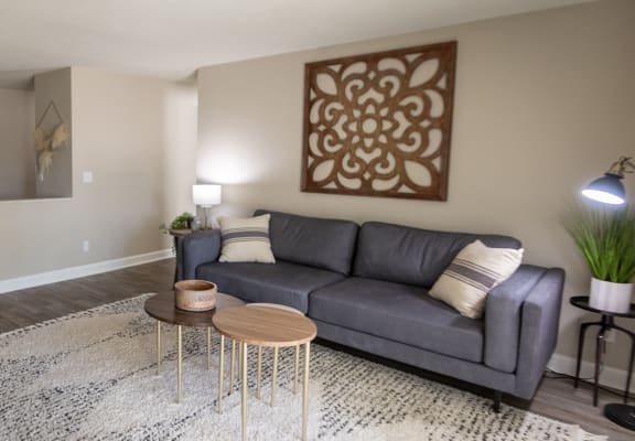 This is picture of the living room and dining area in the 823 square foot 2 bedroom apartment at Aspen Village Apartments in the Westwood neighborhood of Cincinnati, OH.