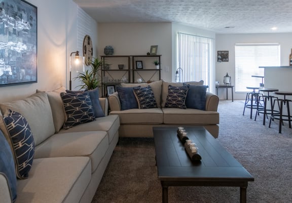 This is a photo of the living room in the 1100 square foot 2 bedroom Kettering floor plan at Washington Park Apartments in Centerville, OH.