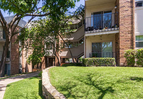 This is a photo of building exteriors/gounds at Cambridge Court Apartments in Dallas, TX.