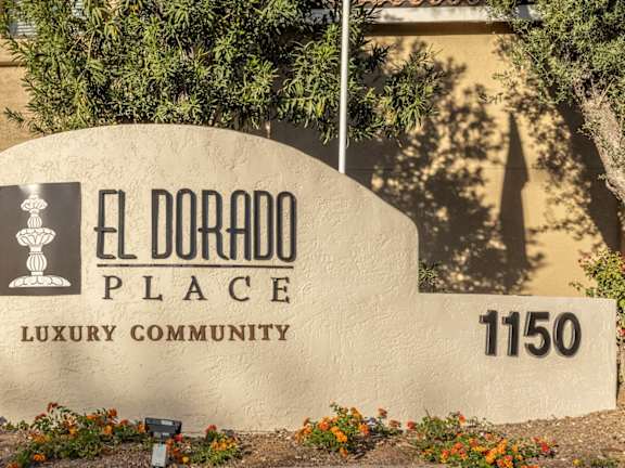 The El Dorado Place sign is in front of a building.