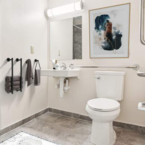 A Bathroom With a White Toilet at Hilldale Apartments, Memphis