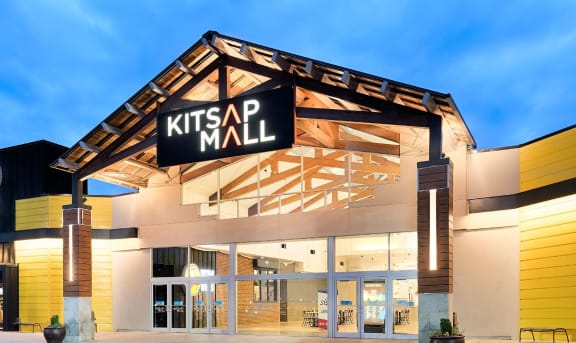 a kitsap mall building lit up at night
