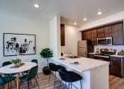 Thumbnail 16 of 31 - Kitchen with counter at Commons at Sylvan Canyon Apartments, Portland, 97221
