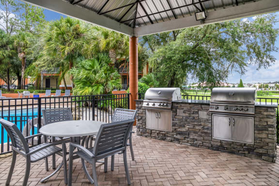 Thumbnail 18 of 20 - BBQ Grill Area at Winthrop West Apartment Homes, Riverview, FL