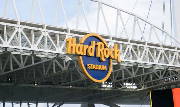 A large stadium sign that says Hard Rock Stadium.